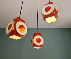 Hot Pamono Space Age Cascade Chandelier in Orange and White Lacquered Metal from Raak, 1970s